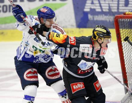 EBEL. Eishockey Bundesliga. EC Pasut VSV gegen EV Vienna Capitals.  Jean Francois Fortin, (VSV), Daniel Nageler (Vienna). Villach, am 17.1.2010.
Foto: Kuess 


---
pressefotos, pressefotografie, kuess, qs, qspictures, sport, bild, bilder, bilddatenbank