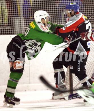 Eishockey CHL. VST Voelkermarkt gegen EC Feld am See.  Boris Pretnar (Voelkermarkt), Thomas Zammernig (Feld am See). Voelkermarkt, am 16.1.2010.
Foto: Kuess 


---
pressefotos, pressefotografie, kuess, qs, qspictures, sport, bild, bilder, bilddatenbank