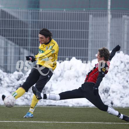 Fussball Bundesliga. Testspiel SK Austria Kaernten gegen SK St. Andrae/WAC. Eldin Adilovic (Austria Kaernten), Patrick Pfennich (St. Andrae/WAC). Klagenfurt, am 19.1.2010.
Foto: Kuess
---
pressefotos, pressefotografie, kuess, qs, qspictures, sport, bild, bilder, bilddatenbank