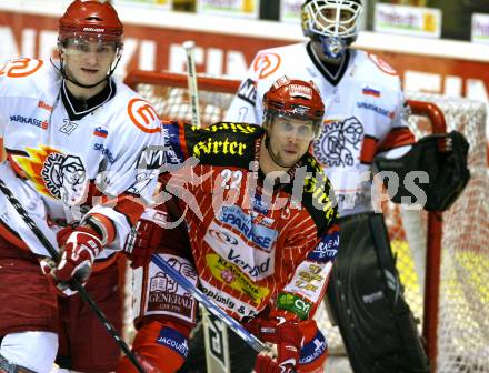 EBEL. Eishockey Bundesliga. KAC gegen HK Acroni Jesenice. Jason Morgan,  (KAC), Miha Rebolj, Dov Grumet-Morris (Jesenice). Klagenfurt, am 22.1.2010.
Foto: Kuess

---
pressefotos, pressefotografie, kuess, qs, qspictures, sport, bild, bilder, bilddatenbank