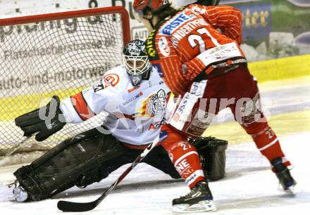 EBEL. Eishockey Bundesliga. KAC gegen HK Acroni Jesenice. Thomas Hundertpfund, (KAC), Dov Grumet-Morris (Jesenice). Klagenfurt, am 22.1.2010.
Foto: Kuess

---
pressefotos, pressefotografie, kuess, qs, qspictures, sport, bild, bilder, bilddatenbank