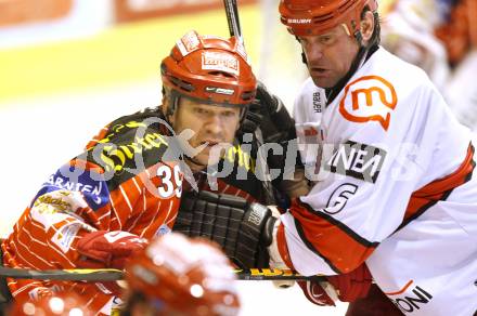 EBEL. Eishockey Bundesliga. KAC gegen HK Acroni Jesenice. Jeff Shantz, (KAC), Todd Elik (Jesenice). Klagenfurt, am 22.1.2010.
Foto: Kuess

---
pressefotos, pressefotografie, kuess, qs, qspictures, sport, bild, bilder, bilddatenbank