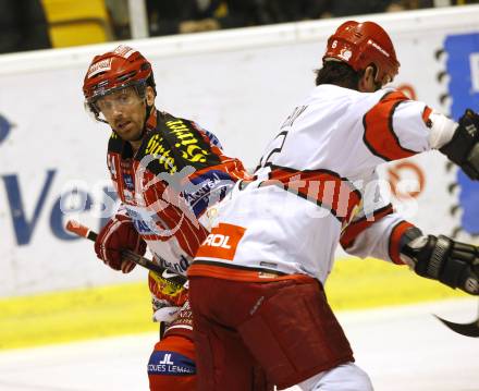 EBEL. Eishockey Bundesliga. KAC gegen HK Acroni Jesenice. Andrew Schneider, (KAC), Todd Elik (Jesenice). Klagenfurt, am 22.1.2010.
Foto: Kuess

---
pressefotos, pressefotografie, kuess, qs, qspictures, sport, bild, bilder, bilddatenbank