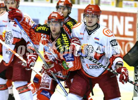 EBEL. Eishockey Bundesliga. KAC gegen HK Acroni Jesenice. Jason Morgan, (KAC), Miha Rebolj (Jesenice). Klagenfurt, am 22.1.2010.
Foto: Kuess

---
pressefotos, pressefotografie, kuess, qs, qspictures, sport, bild, bilder, bilddatenbank