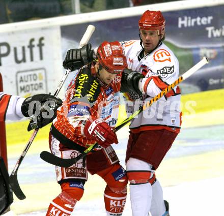 EBEL. Eishockey Bundesliga. KAC gegen HK Acroni Jesenice. Jeff Shantz, (KAC), Todd Elik (Jesenice). Klagenfurt, am 22.1.2010.
Foto: Kuess

---
pressefotos, pressefotografie, kuess, qs, qspictures, sport, bild, bilder, bilddatenbank