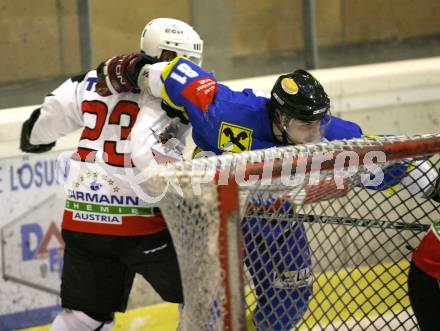 Eishockey CHL. EC Tarco Woelfe Klagenfurt gegen UEC Leisach. Michael Krainer Bidovec (Tarco), Ota Lazorisak (Leisach). Klagenfurt, am 23.1.2010.
Foto: Kuess

---
pressefotos, pressefotografie, kuess, qs, qspictures, sport, bild, bilder, bilddatenbank