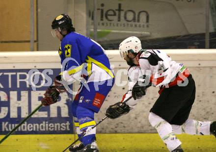 Eishockey CHL. EC Tarco Woelfe Klagenfurt gegen UEC Leisach. Andreas Moschik (Tarco), Ota Lazorisak (Leisach). Klagenfurt, am 23.1.2010.
Foto: Kuess

---
pressefotos, pressefotografie, kuess, qs, qspictures, sport, bild, bilder, bilddatenbank