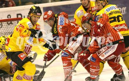 EBEL. Eishockey Bundesliga. KAC gegen EV Vienna Capitals. Gregor Hager, Kirk Furey (KAC), SARAULT Yves (Caps). Klagenfurt, am 24.1.2010.
Foto: Kuess

---
pressefotos, pressefotografie, kuess, qs, qspictures, sport, bild, bilder, bilddatenbank