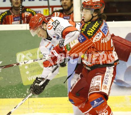 EBEL. Eishockey Bundesliga. KAC gegen HK Acroni Jesenice. Thomas Hundertpfund (KAC), Sabahudin Kovacevic (Jesenice). Klagenfurt, am 22.1.2010.
Foto: Kuess

---
pressefotos, pressefotografie, kuess, qs, qspictures, sport, bild, bilder, bilddatenbank