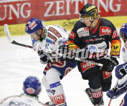 EBEL. Eishockey Bundesliga. EC Pasut VSV gegen EV Vienna Capitals. Mickey Elick (VSV), Daniel Nageler (Vienna). Villach, am 17.1.2010.
Foto: Kuess 


---
pressefotos, pressefotografie, kuess, qs, qspictures, sport, bild, bilder, bilddatenbank