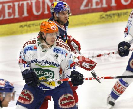 EBEL. Eishockey Bundesliga. EC Pasut VSV gegen Red Bulls Salzburg.  Michael Raffl, (VSV),  Andre Lakos (Salzburg). Villach, am 31.1.2010.
Foto: Kuess 


---
pressefotos, pressefotografie, kuess, qs, qspictures, sport, bild, bilder, bilddatenbank