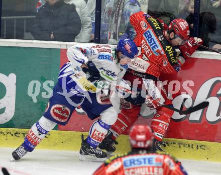 EBEL. Eishockey Bundesliga. EC Pasut VSV gegen KAC. Michael Raffl,  (VSV),  Kirk Furey (KAC). Villach, am 5.2.2010.
Foto: Kuess 


---
pressefotos, pressefotografie, kuess, qs, qspictures, sport, bild, bilder, bilddatenbank