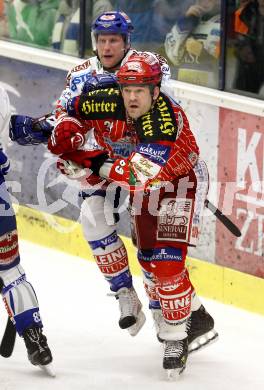 EBEL. Eishockey Bundesliga. EC Pasut VSV gegen KAC.  Guenther Lanzinger, (VSV), Jeff Shantz (KAC). Villach, am 5.2.2010.
Foto: Kuess 


---
pressefotos, pressefotografie, kuess, qs, qspictures, sport, bild, bilder, bilddatenbank