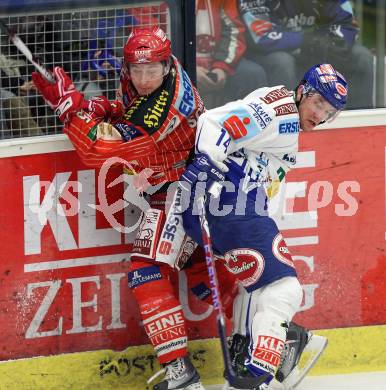 EBEL. Eishockey Bundesliga. EC Pasut VSV gegen KAC. Nathan Robert Di Casmirro, (VSV), David Schuller (KAC). Villach, am 5.2.2010.
Foto: Kuess 


---
pressefotos, pressefotografie, kuess, qs, qspictures, sport, bild, bilder, bilddatenbank