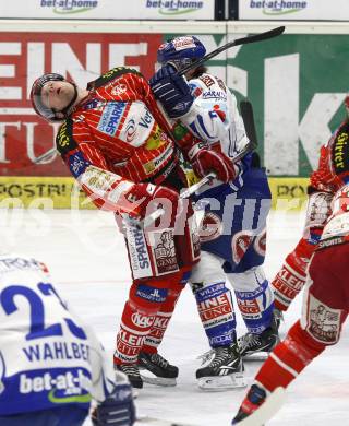 EBEL. Eishockey Bundesliga. EC Pasut VSV gegen KAC. Christian Ban,  (VSV),  Andrew Schneider (KAC). Villach, am 5.2.2010.
Foto: Kuess 


---
pressefotos, pressefotografie, kuess, qs, qspictures, sport, bild, bilder, bilddatenbank