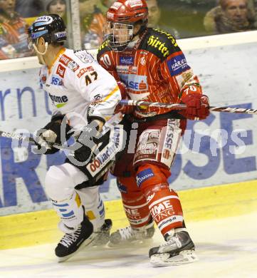 EBEL. Eishockey Bundesliga. KAC gegen EHC LIWEST Linz. Markus Poeck, (KAC), Rich Bronilla (Linz). Klagenfurt, am 7.2.2010.
Foto: Kuess

---
pressefotos, pressefotografie, kuess, qs, qspictures, sport, bild, bilder, bilddatenbank