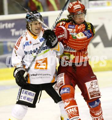 EBEL. Eishockey Bundesliga. KAC gegen EHC LIWEST Linz. Thomas HUndertpfund, (KAC), Franklin Macdonald (Linz). Klagenfurt, am 7.2.2010.
Foto: Kuess

---
pressefotos, pressefotografie, kuess, qs, qspictures, sport, bild, bilder, bilddatenbank