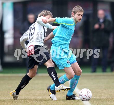 Fussball. Tipp3-Bundesliga. SK Austria Kaernten gegen SK Puntigamer Sturm Graz. Stefan Hierlaender, (Austria Kaernten), Manuel Weber (Graz). Klagenfurt, 14.2.2010.
Foto: Kuess 

---
pressefotos, pressefotografie, kuess, qs, qspictures, sport, bild, bilder, bilddatenbank