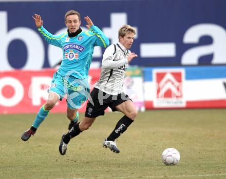 Fussball. Tipp3-Bundesliga. SK Austria Kaernten gegen SK Puntigamer Sturm Graz. Thomas Hinum, (Austria Kaernten), Daniel Beichler (Graz). Klagenfurt, 14.2.2010.
Foto: Kuess 

---
pressefotos, pressefotografie, kuess, qs, qspictures, sport, bild, bilder, bilddatenbank