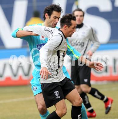 Fussball. Tipp3-Bundesliga. SK Austria Kaernten gegen SK Puntigamer Sturm Graz. Matthias Dollinger, (Austria Kaernten), Peter Hlinka (Graz). Klagenfurt, 14.2.2010.
Foto: Kuess 

---
pressefotos, pressefotografie, kuess, qs, qspictures, sport, bild, bilder, bilddatenbank