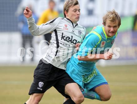 Fussball. Tipp3-Bundesliga. SK Austria Kaernten gegen SK Puntigamer Sturm Graz. Stefan Hierlaender, (Austria Kaernten), Mario Sonnleitner (Graz). Klagenfurt, 14.2.2010.
Foto: Kuess 

---
pressefotos, pressefotografie, kuess, qs, qspictures, sport, bild, bilder, bilddatenbank