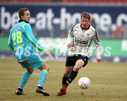 Fussball. Tipp3-Bundesliga. SK Austria Kaernten gegen SK Puntigamer Sturm Graz. Thomas Riedl, (Austria Kaernten), Daniel Beichler (Graz). Klagenfurt, 14.2.2010.
Foto: Kuess 

---
pressefotos, pressefotografie, kuess, qs, qspictures, sport, bild, bilder, bilddatenbank