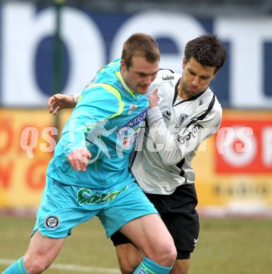 Fussball. Tipp3-Bundesliga. SK Austria Kaernten gegen SK Puntigamer Sturm Graz. Luka Elsner, (Austria Kaernten), Klemen Lavric (Graz). Klagenfurt, 14.2.2010.
Foto: Kuess 

---
pressefotos, pressefotografie, kuess, qs, qspictures, sport, bild, bilder, bilddatenbank