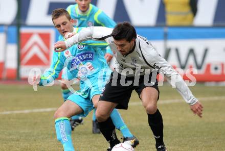 Fussball. Tipp3-Bundesliga. SK Austria Kaernten gegen SK Puntigamer Sturm Graz. Fernando Troyanski, (Austria Kaernten),  Klemen Lavric (Graz). Klagenfurt, 14.2.2010.
Foto: Kuess 

---
pressefotos, pressefotografie, kuess, qs, qspictures, sport, bild, bilder, bilddatenbank