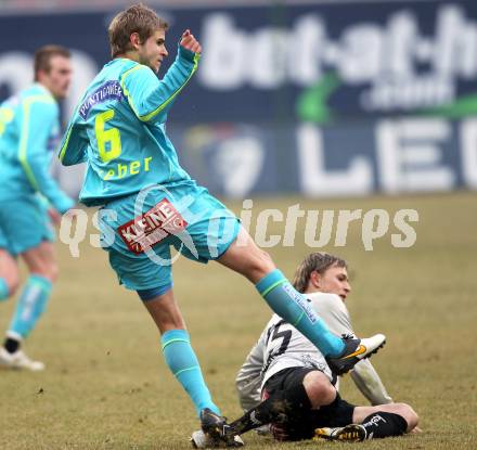 Fussball. Tipp3-Bundesliga. SK Austria Kaernten gegen SK Puntigamer Sturm Graz. Stefan Hierlaender, (Austria Kaernten), Manuel Weber (Graz). Klagenfurt, 14.2.2010.
Foto: Kuess 

---
pressefotos, pressefotografie, kuess, qs, qspictures, sport, bild, bilder, bilddatenbank