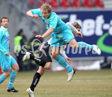 Fussball. Tipp3-Bundesliga. SK Austria Kaernten gegen SK Puntigamer Sturm Graz. Stefan Hierlaender,(Austria Kaernten),  Mario Sonnleitner (Graz). Klagenfurt, 14.2.2010.
Foto: Kuess 

---
pressefotos, pressefotografie, kuess, qs, qspictures, sport, bild, bilder, bilddatenbank