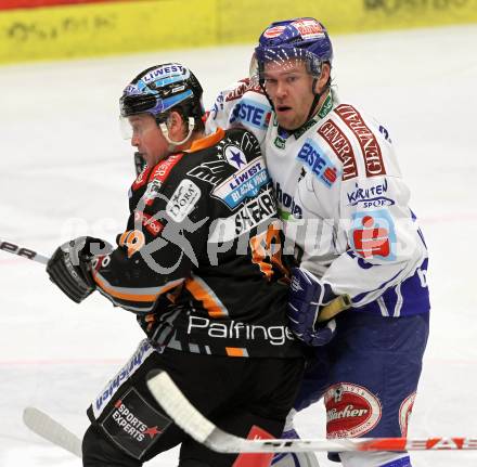 EBEL. Eishockey Bundesliga. EC Pasut VSV gegen EHC LIWEST Linz.  Mikael Wahlberg, (VSV),  Robert Shearer (Linz). Villach, am 19.2.2010.
Foto: Kuess 


---
pressefotos, pressefotografie, kuess, qs, qspictures, sport, bild, bilder, bilddatenbank