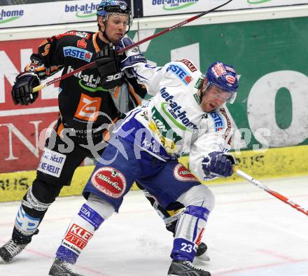 EBEL. Eishockey Bundesliga. EC Pasut VSV gegen EHC LIWEST Linz.  Mikael Wahlberg, (VSV),  Gregor Baumgartner (Linz). Villach, am 19.2.2010.
Foto: Kuess 


---
pressefotos, pressefotografie, kuess, qs, qspictures, sport, bild, bilder, bilddatenbank