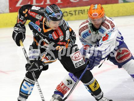 EBEL. Eishockey Bundesliga. EC Pasut VSV gegen EHC LIWEST Linz.  Roland Kaspitz, (VSV),  Martin Grabher Meier (Linz). Villach, am 19.2.2010.
Foto: Kuess 


---
pressefotos, pressefotografie, kuess, qs, qspictures, sport, bild, bilder, bilddatenbank