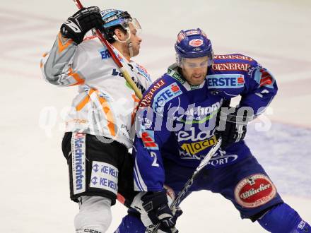 EBEL. Eishockey Bundesliga. EC Pasut VSV gegen EHC LIWEST Linz.  Michael Mike Martin, (VSV),  Philipp Lukas (Linz). Villach, am 23.2.2010.
Foto: Kuess 


---
pressefotos, pressefotografie, kuess, qs, qspictures, sport, bild, bilder, bilddatenbank