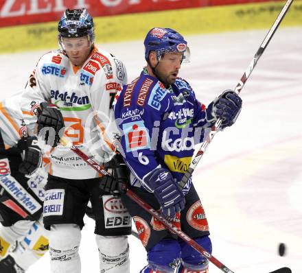 EBEL. Eishockey Bundesliga. EC Pasut VSV gegen EHC LIWEST Linz.  Gerhard Unterluggauer, (VSV),  Gregor Baumgartner (Linz). Villach, am 23.2.2010.
Foto: Kuess 


---
pressefotos, pressefotografie, kuess, qs, qspictures, sport, bild, bilder, bilddatenbank