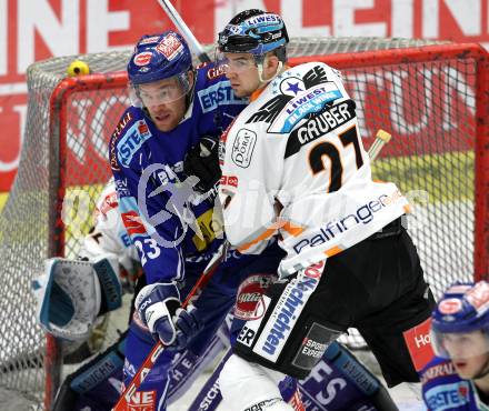 EBEL. Eishockey Bundesliga. EC Pasut VSV gegen EHC LIWEST Linz.  Mikael Wahlberg, (VSV), Gerd Gruber (Linz). Villach, am 23.2.2010.
Foto: Kuess 


---
pressefotos, pressefotografie, kuess, qs, qspictures, sport, bild, bilder, bilddatenbank