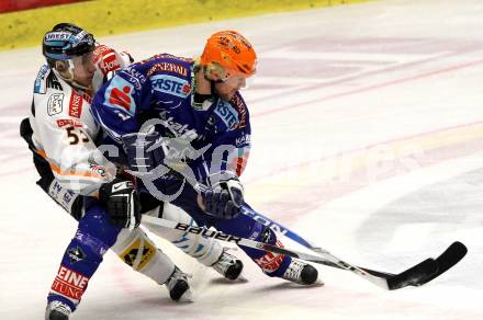 EBEL. Eishockey Bundesliga. EC Pasut VSV gegen EHC LIWEST Linz.  Roland Kaspitz, (VSV), Robert Lukas (Linz). Villach, am 23.2.2010.
Foto: Kuess 


---
pressefotos, pressefotografie, kuess, qs, qspictures, sport, bild, bilder, bilddatenbank