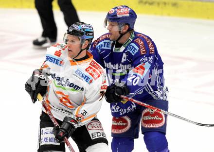 EBEL. Eishockey Bundesliga. EC Pasut VSV gegen EHC LIWEST Linz.  Mickey Elick, (VSV),  Gregor Baumgartner (Linz). Villach, am 23.2.2010.
Foto: Kuess 


---
pressefotos, pressefotografie, kuess, qs, qspictures, sport, bild, bilder, bilddatenbank