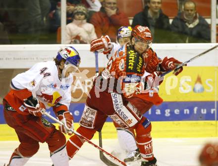 EBEL. Eishockey Bundesliga. KAC gegen EC Red Bull Salzburg. MORGAN Jason (KAC), LYNCH Douglas (Salzburg). Klagenfurt, am 23.2.2010.
Foto: Kuess

---
pressefotos, pressefotografie, kuess, qs, qspictures, sport, bild, bilder, bilddatenbank