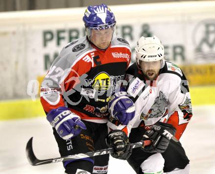 Eishockey Carinthian Hockey League CHL.  EC Tarco Woelfe Klagenfurt gegen EC Feld am See. Andreas Moschik (Tarco), Guenter Kilzer (Feld am See). Klagenfurt, am 25.2.2010.
Foto: Kuess

---
pressefotos, pressefotografie, kuess, qs, qspictures, sport, bild, bilder, bilddatenbank