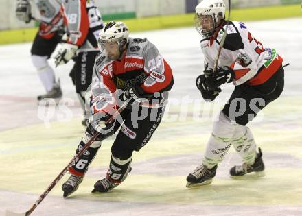 Eishockey Carinthian Hockey League CHL.  EC Tarco Woelfe Klagenfurt gegen EC Feld am See. Thomas Plautz (Tarco), Roland Sittlinger (Feld am See). Klagenfurt, am 25.2.2010.
Foto: Kuess

---
pressefotos, pressefotografie, kuess, qs, qspictures, sport, bild, bilder, bilddatenbank