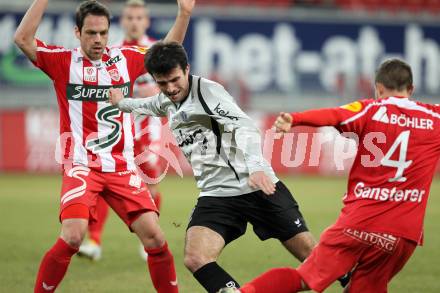 Fussball. Tipp3-Bundesliga. SK Austria Kelag Kaernten  gegen KSV Superfund Kapfenberger SV. Goran Aleksic, (Austria Kaernten), Andreas Rauscher, Gerald Gansterer (Kapfenberg). Klagenfurt, 27.2.2010. 
Foto: Kuess

---
pressefotos, pressefotografie, kuess, qs, qspictures, sport, bild, bilder, bilddatenbank