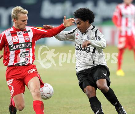 Fussball. Tipp3-Bundesliga. SK Austria Kelag Kaernten  gegen KSV Superfund Kapfenberger SV. Sandro Ferreira Da Silva, (Austria Kaernten), Manuel Schmid (Kapfenberg). Klagenfurt, 27.2.2010. 
Foto: Kuess

---
pressefotos, pressefotografie, kuess, qs, qspictures, sport, bild, bilder, bilddatenbank