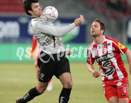 Fussball. Tipp3-Bundesliga. SK Austria Kelag Kaernten  gegen KSV Superfund Kapfenberger SV. Goran Aleksic, (Austria Kaernten), Andreas Rauscher (Kapfenberg). Klagenfurt, 27.2.2010. 
Foto: Kuess

---
pressefotos, pressefotografie, kuess, qs, qspictures, sport, bild, bilder, bilddatenbank