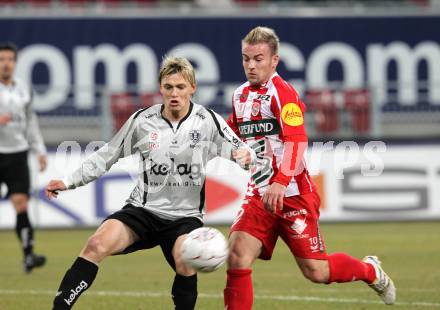 Fussball. Tipp3-Bundesliga. SK Austria Kelag Kaernten  gegen KSV Superfund Kapfenberger SV. Stefan Hierlaender, (Austria Kaernten), David Sencar (Kapfenberg). Klagenfurt, 27.2.2010. 
Foto: Kuess

---
pressefotos, pressefotografie, kuess, qs, qspictures, sport, bild, bilder, bilddatenbank