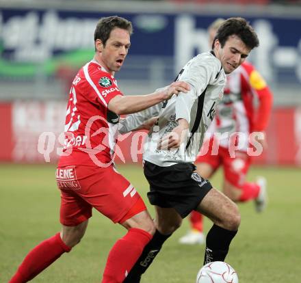 Fussball. Tipp3-Bundesliga. SK Austria Kelag Kaernten  gegen KSV Superfund Kapfenberger SV. Goran Aleksic, (Austria Kaernten), Andreas Rauscher (Kapfenberg). Klagenfurt, 27.2.2010. 
Foto: Kuess

---
pressefotos, pressefotografie, kuess, qs, qspictures, sport, bild, bilder, bilddatenbank