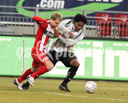 Fussball. Tipp3-Bundesliga. SK Austria Kelag Kaernten  gegen KSV Superfund Kapfenberger SV. Sandro ferreira Da Silva, (Austria Kaernten), Markus Felfernig (Kapfenberg). Klagenfurt, 27.2.2010. 
Foto: Kuess

---
pressefotos, pressefotografie, kuess, qs, qspictures, sport, bild, bilder, bilddatenbank