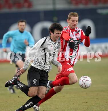 Fussball. Tipp3-Bundesliga. SK Austria Kelag Kaernten  gegen KSV Superfund Kapfenberger SV. Goran Aleksic, (Austria Kaernten), Milan Fukal (Kapfenberg). Klagenfurt, 27.2.2010. 
Foto: Kuess

---
pressefotos, pressefotografie, kuess, qs, qspictures, sport, bild, bilder, bilddatenbank