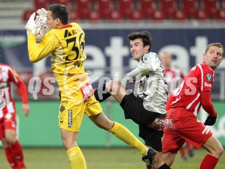 Fussball. Tipp3-Bundesliga. SK Austria Kelag Kaernten  gegen KSV Superfund Kapfenberger SV. Goran Aleksic, (Austria Kaernten), Raphael Wolf (Kapfenberg). Klagenfurt, 27.2.2010. 
Foto: Kuess

---
pressefotos, pressefotografie, kuess, qs, qspictures, sport, bild, bilder, bilddatenbank