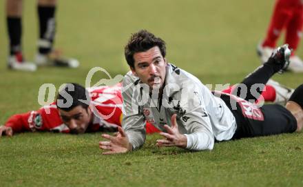 Fussball. Tipp3-Bundesliga. SK Austria Kelag Kaernten  gegen KSV Superfund Kapfenberger SV. Fernando Troyansky, (Austria Kaernten), Robert Schellander (Kapfenberg). Klagenfurt, 27.2.2010. 
Foto: Kuess

---
pressefotos, pressefotografie, kuess, qs, qspictures, sport, bild, bilder, bilddatenbank